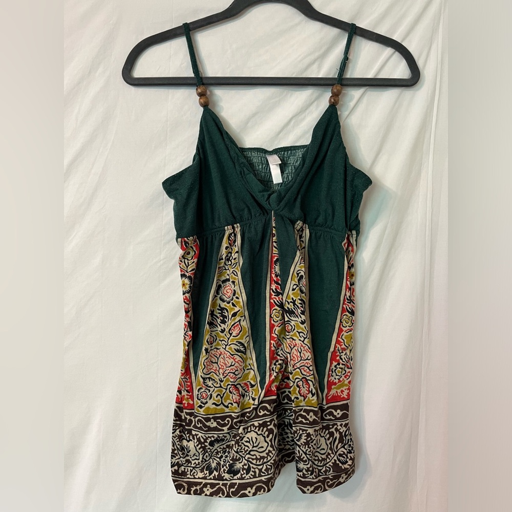 Xhilaration. lightweight top. Dark green with orange, yellow and cream accents.